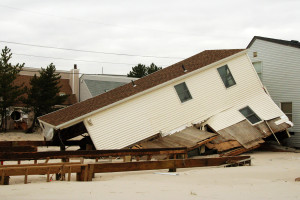 House pushed off of its foundation. Holgate, NJ.