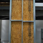 Here is a wood structural panel sheathed CFS framed shear wall. 