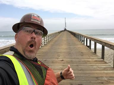 Simpson Strong-Tie Fastening Systems Dealer Sales Representative Darwin Waite takes selfie on the completed dock.