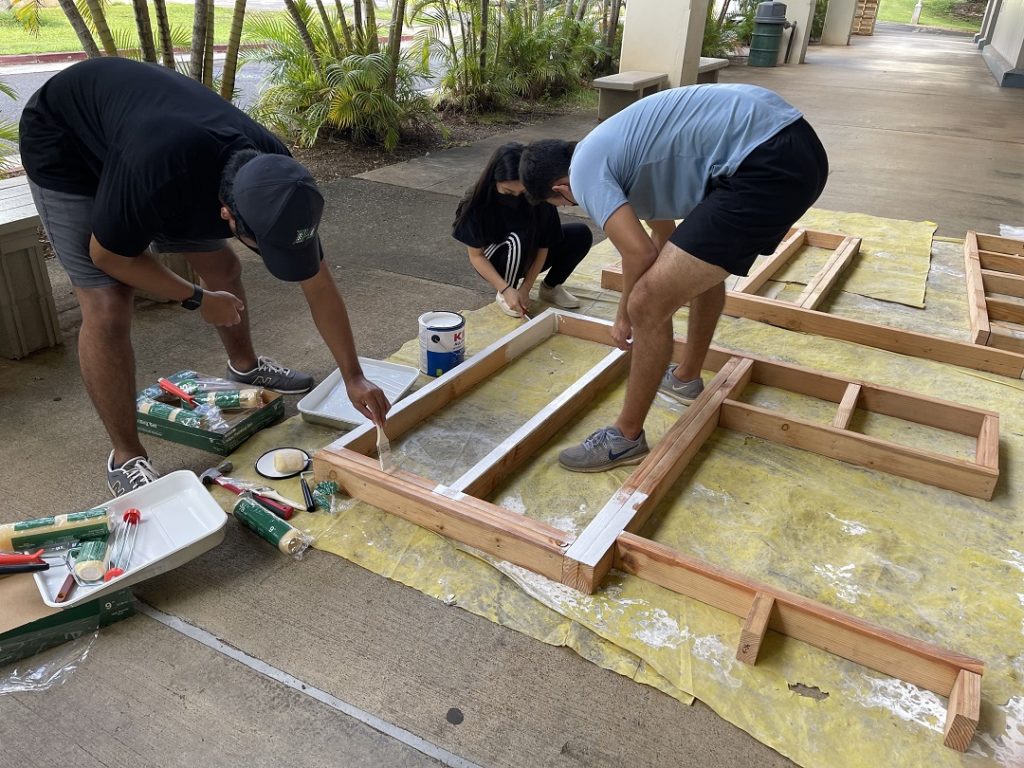 Students painting their Timber-Strong build