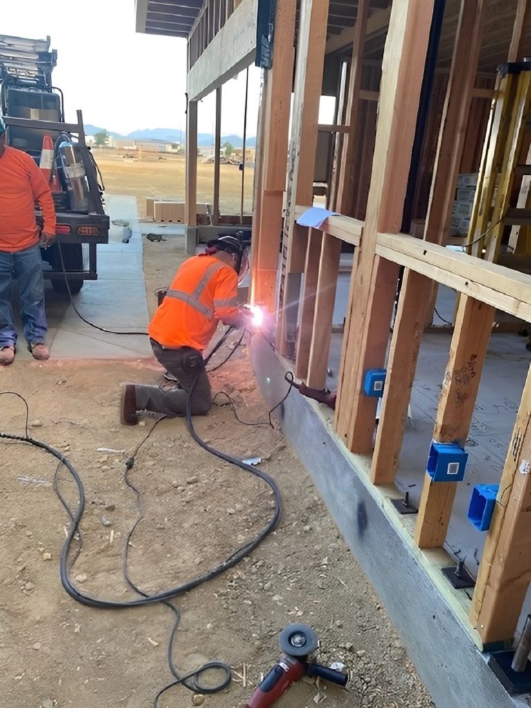 Welding the adaptor on the jobsite