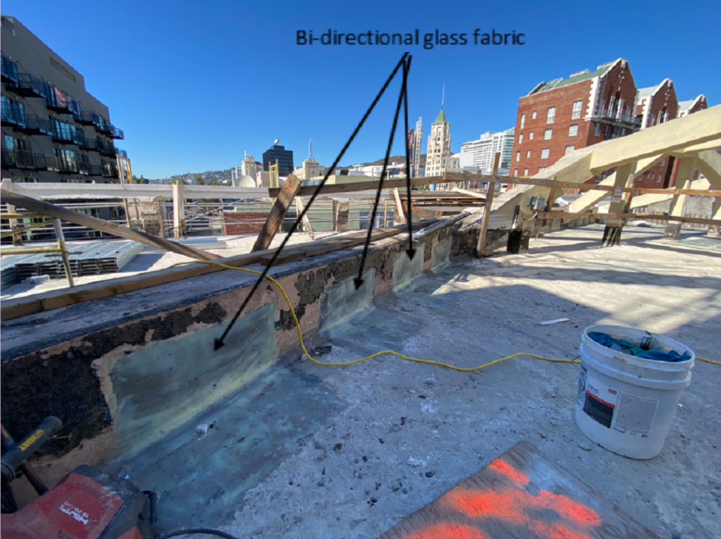 Photo 4: Bidirectional glass FRP was used to strengthen the diaphragm-to-wall connection.