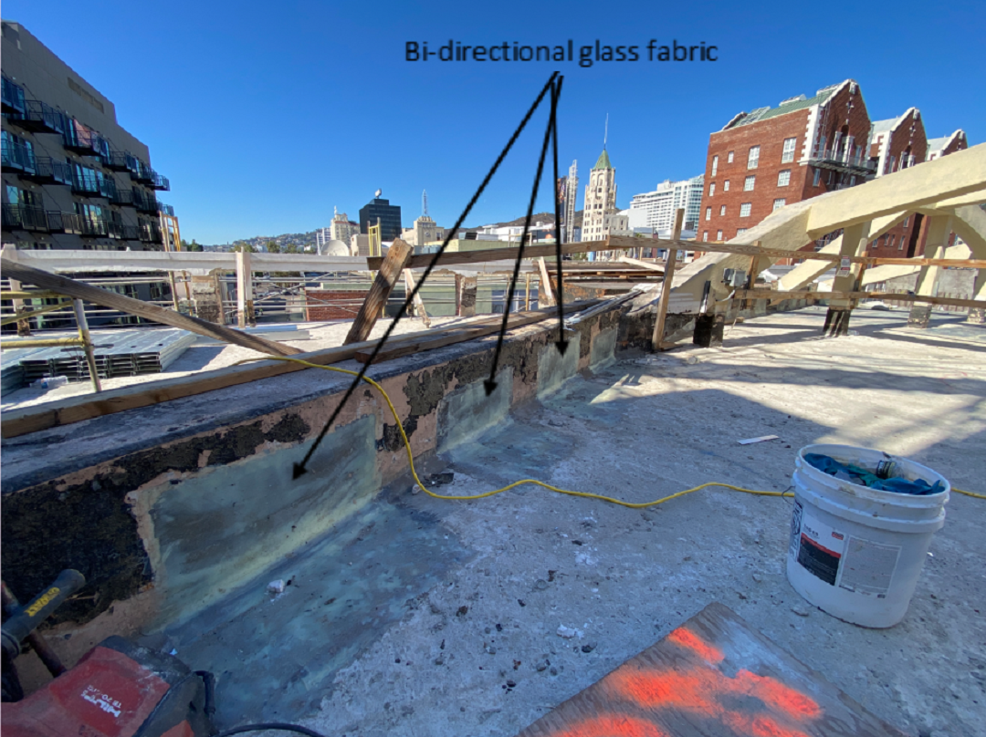 Photo 4: Bidirectional glass FRP was used to strengthen the diaphragm-to-wall connection. 