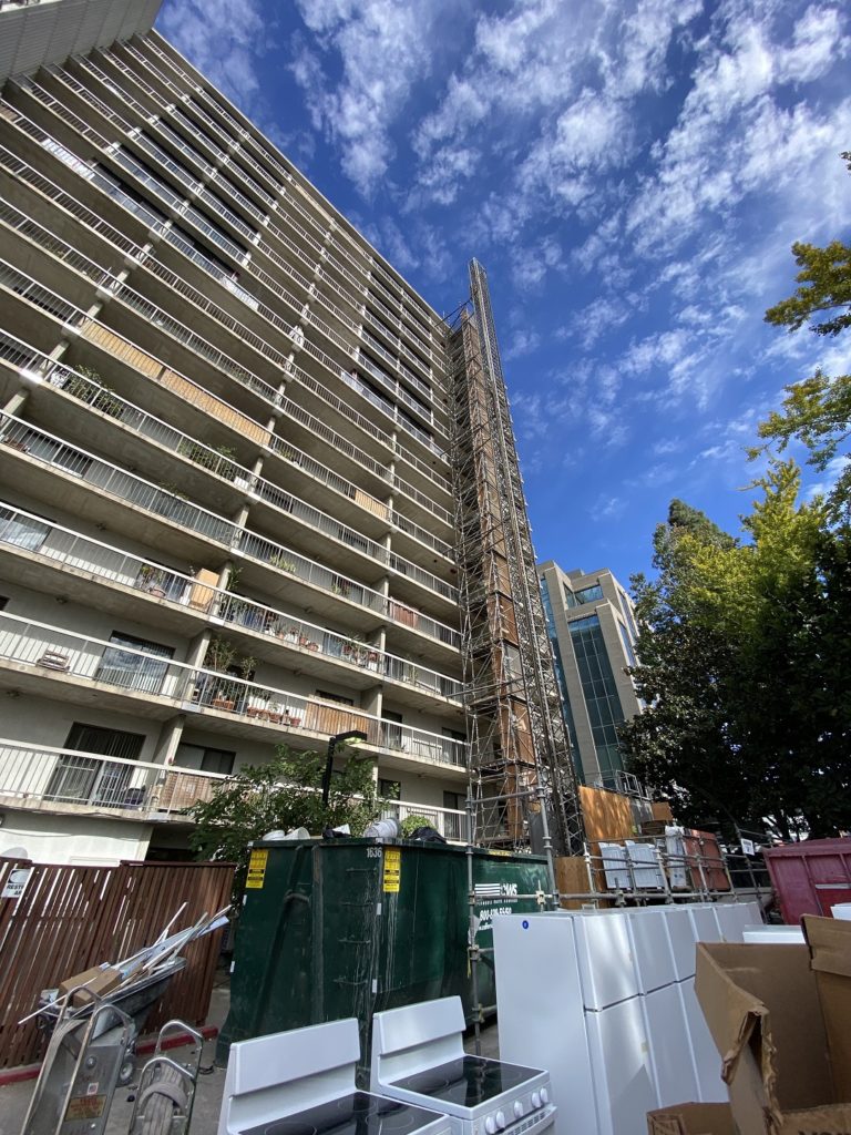 Photo 1: Renovation work begins on Little Tokyo Towers.