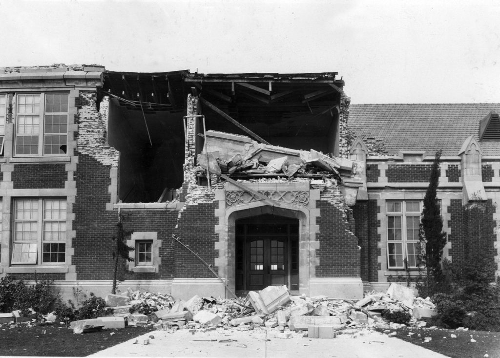 View of John Muir School, showing damage from the March 10 1933 Long Beach earthquake. Located on Pacific Ave. in Long Beach, California. Photo taken 8 days after, on March 18, 1933.