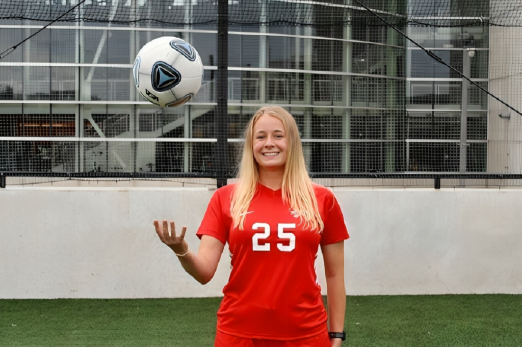 Daphne playing soccer