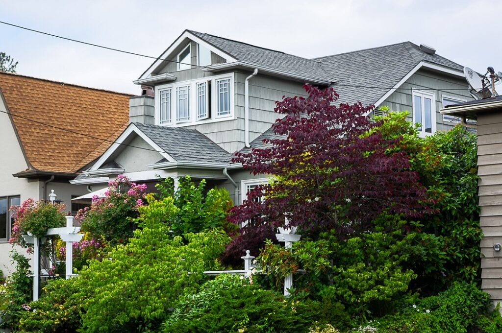 A house exterior and front gardens, Madison Park, Seattle in Madison Park, Seattle USA