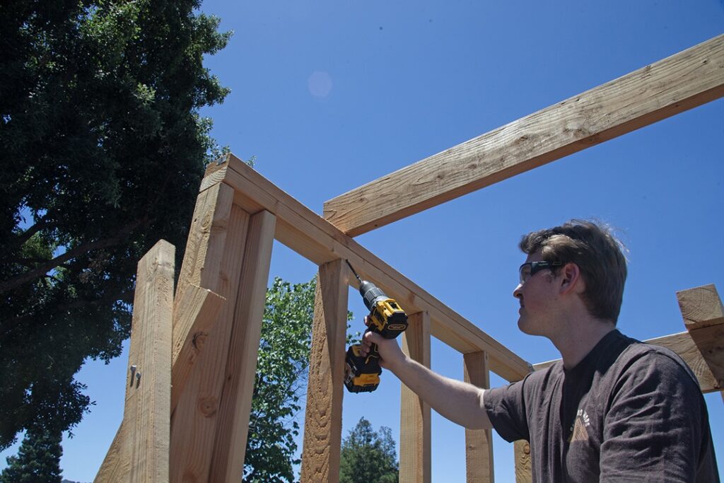 Tristan installing our fasteners